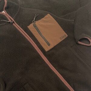 Black Fleece Jacket with Brown Pocket